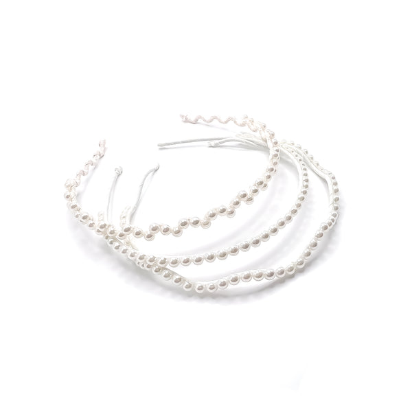Dazzling pearl embellishments light up this luxury fabric-wrapped headband, designed in an ultra-thin silhouette for effortless elegance-Maison Soyenne