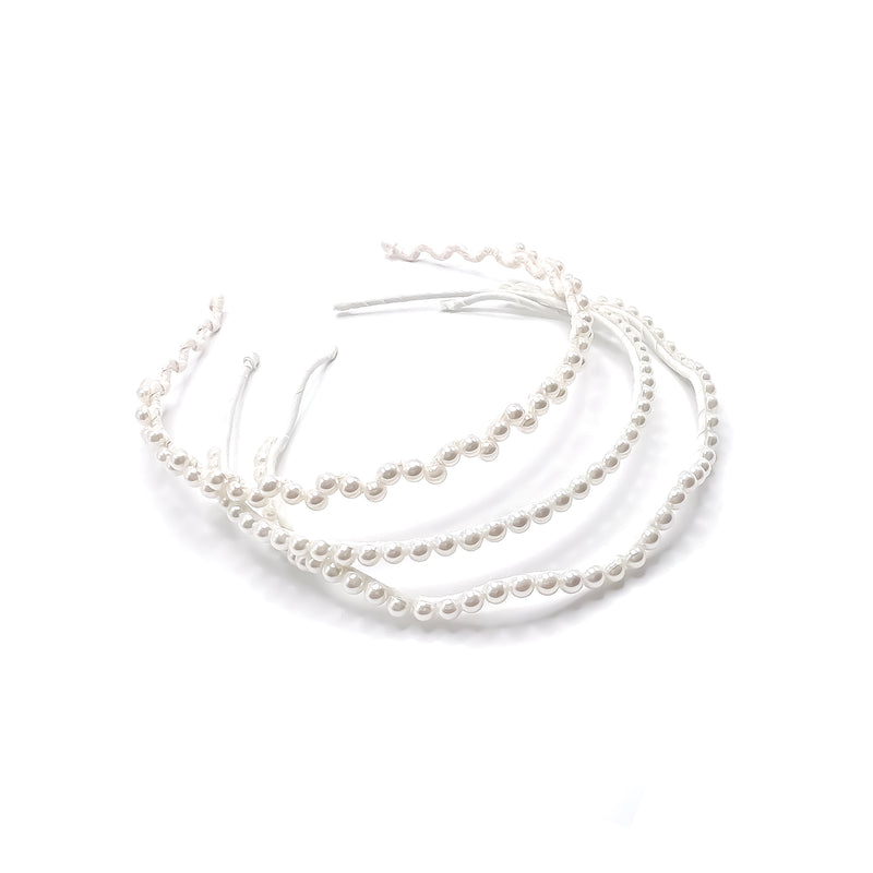 Dazzling pearl embellishments light up this luxury fabric-wrapped headband, designed in an ultra-thin silhouette for effortless elegance-Maison Soyenne