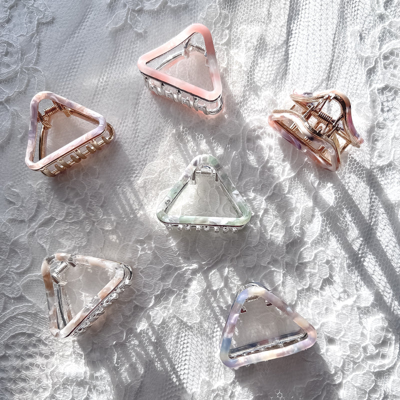 Small triangle French style tortoise hair clip collection in ivory, sage, lavender, blue, and pink, eco-friendly acetate
